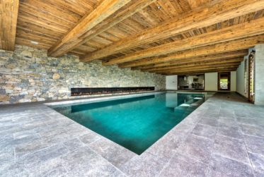 Luxueux chalet avec piscine intérieure ski in/out accessible à l'année