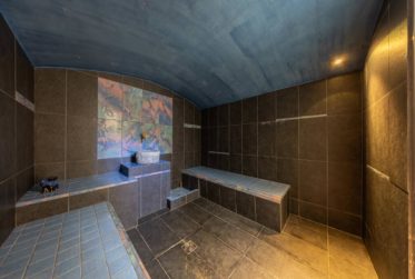 Villa with wellness area surrounded by apricot fields