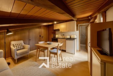 Transversing attic flat in the centre of the village