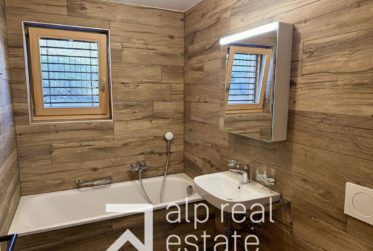 New 1-bedroom apartment with South-facing terrace and mountain views