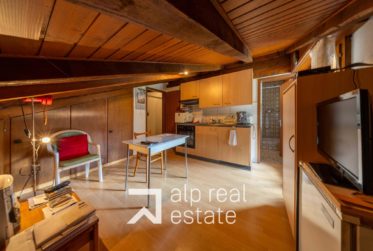 Transversing attic flat in the centre of the village