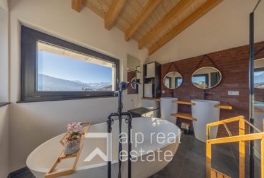 Villa neuve de standing avec vue spectaculaire sur le lac du Louché et les Alpes