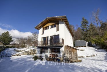 Superb family home with heated veranda and open views